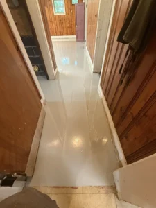 commercial-epoxy-floor-corridor-seamless-finish.webp