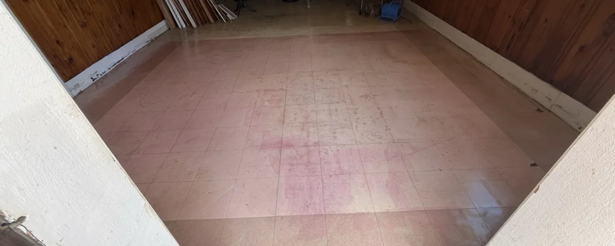 Existing commercial concrete floor before epoxy flooring installation and surface preparation