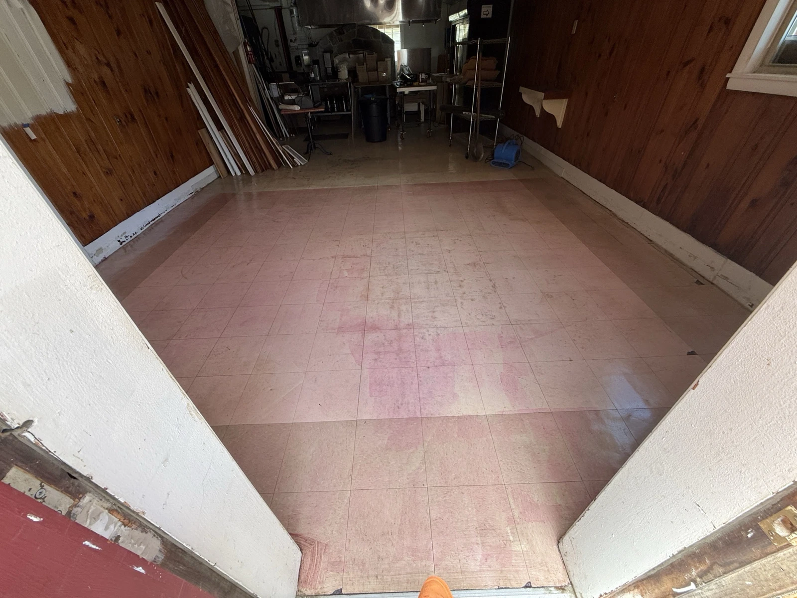 Existing commercial concrete floor before epoxy flooring installation and surface preparation